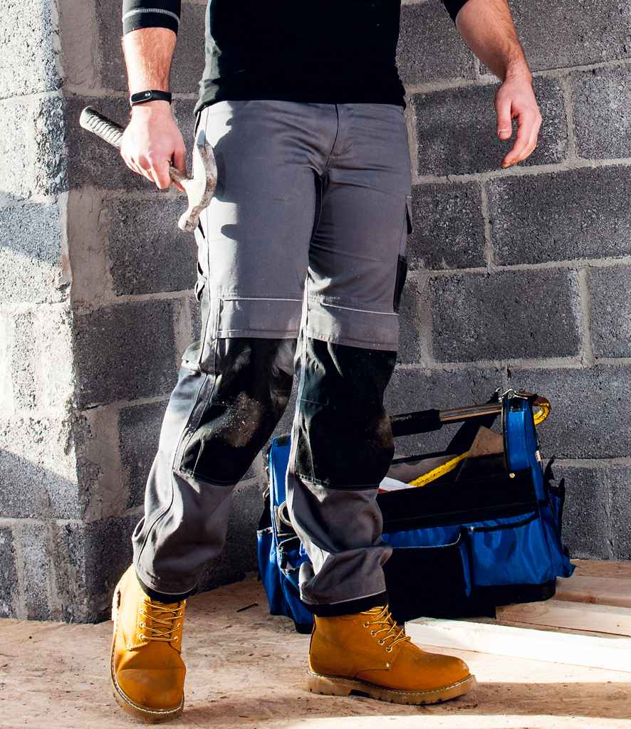 Portwest PW3 Work Trousers in 30 R Zoom Grey Black by Portwest — Custom branded clothing by Print Press, featuring premium embroidery produced in our specialist print lab in the UK.