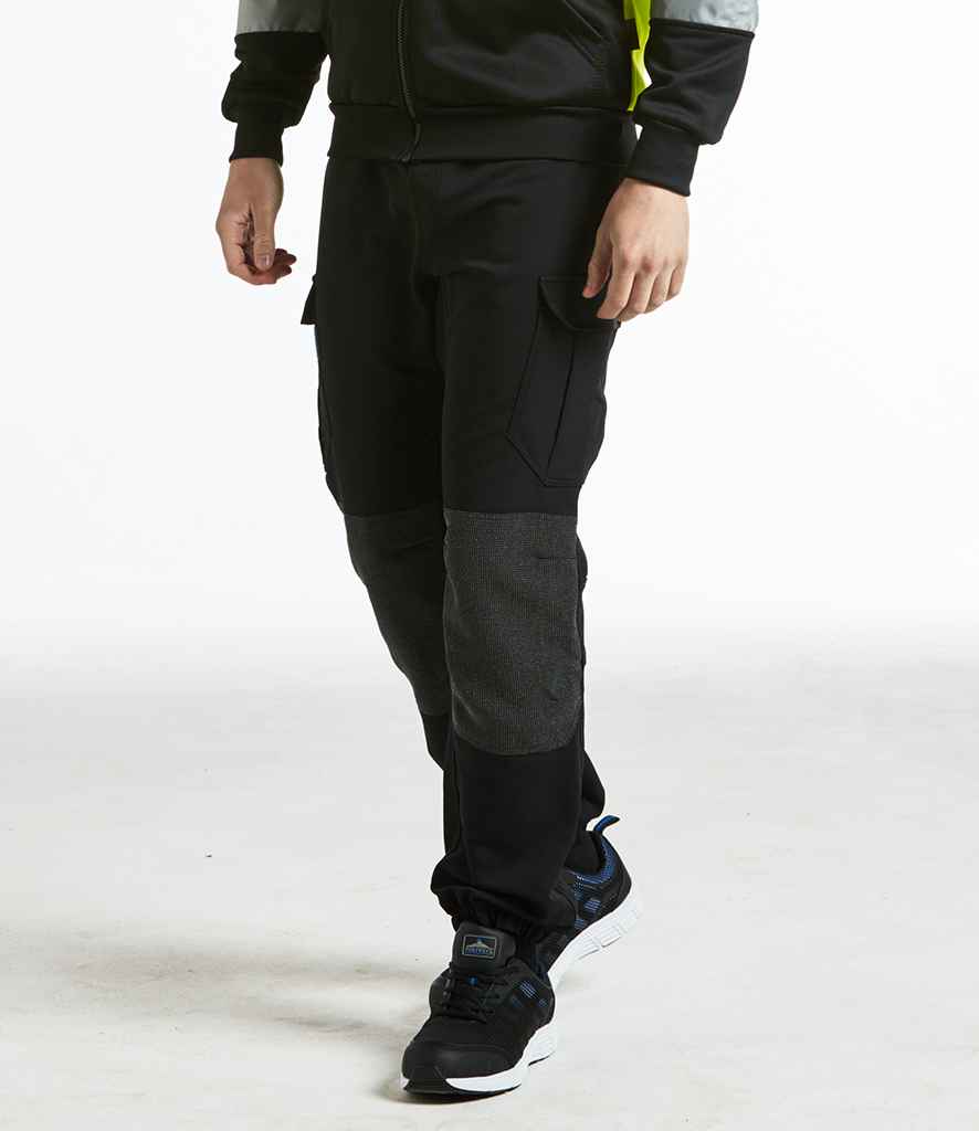 Portwest KX3 Flexi Trousers in by Portwest — Custom branded clothing by Print Press, featuring premium embroidery produced in our specialist print lab in the UK.