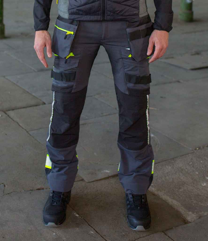 Portwest DX4 Detachable Holster Pocket Trousers in R Metal Grey by Portwest — Custom branded clothing by Print Press, featuring premium embroidery produced in our specialist print lab in the UK.