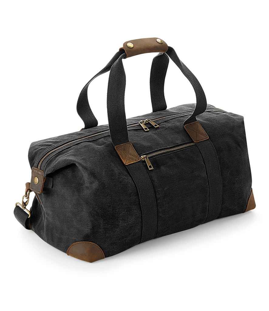 Quadra Heritage Waxed Canvas Holdall in ONE Black by Quadra — Custom branded clothing by Print Press, featuring premium embroidery produced in our specialist print lab in the UK.