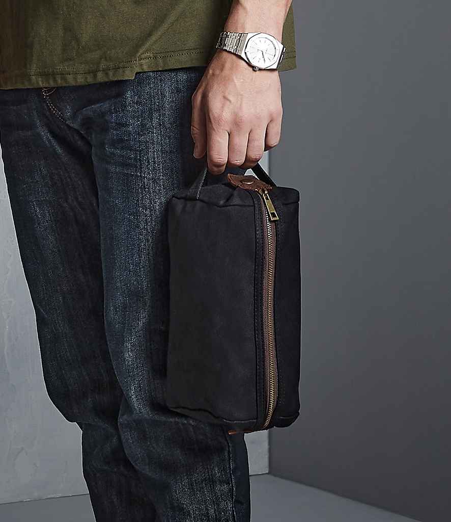 Quadra Heritage Waxed Canvas Wash Bag in ONE Black by Quadra — Custom branded clothing by Print Press, featuring premium embroidery produced in our specialist print lab in the UK.