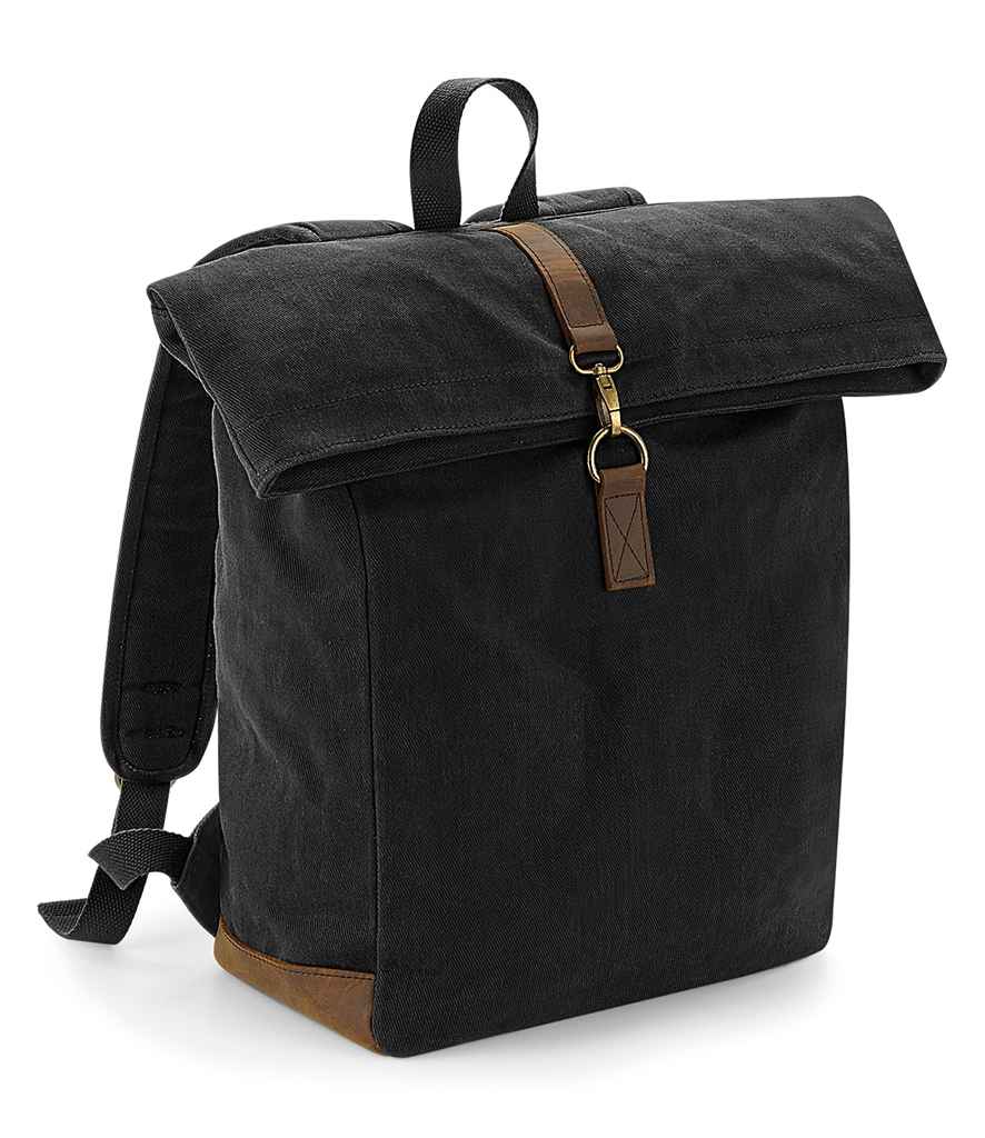 Quadra Heritage Waxed Canvas Backpack in ONE Black by Quadra — Custom branded clothing by Print Press, featuring premium embroidery produced in our specialist print lab in the UK.