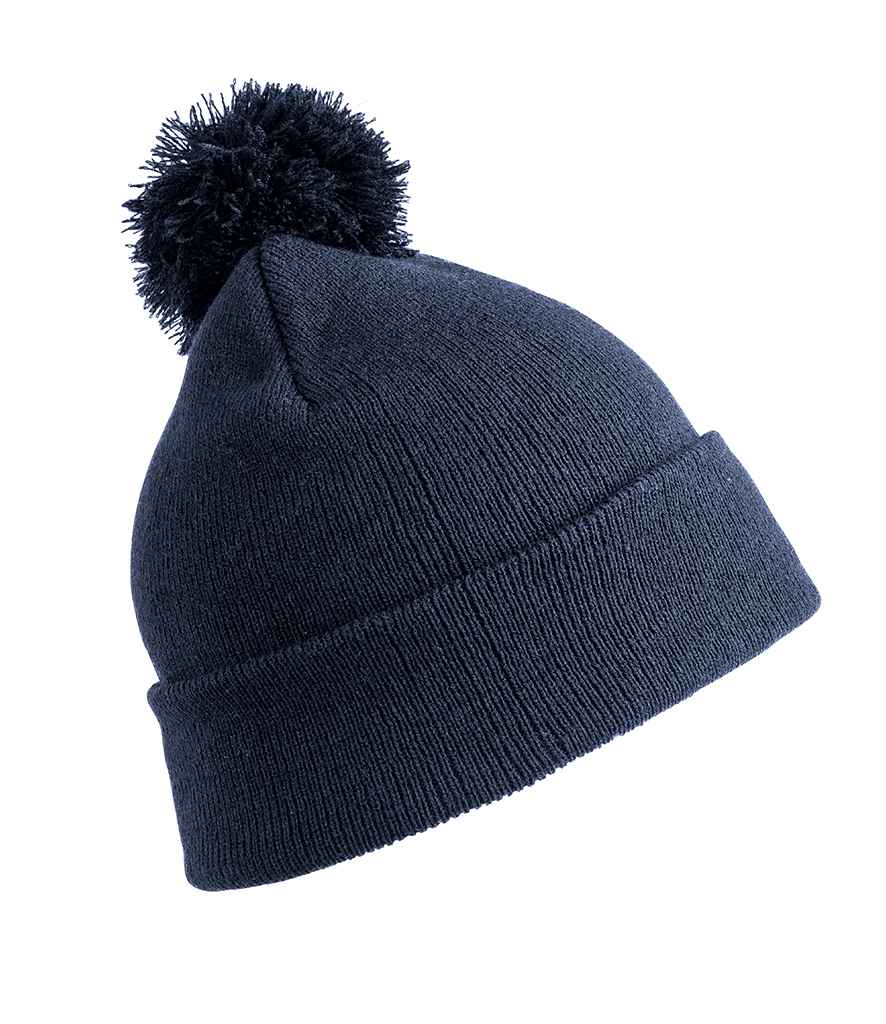 Result Core Kids Pom Pom Beanie in ONE Navy by Result Winter Essentials — Custom branded clothing by Print Press, featuring premium embroidery produced in our specialist print lab in the UK.