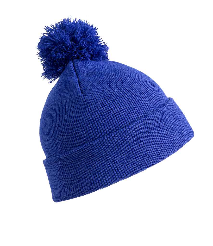 Result Core Pom Pom Beanie in ONE Royal Blue by Result Winter Essentials — Custom branded clothing by Print Press, featuring premium embroidery produced in our specialist print lab in the UK.