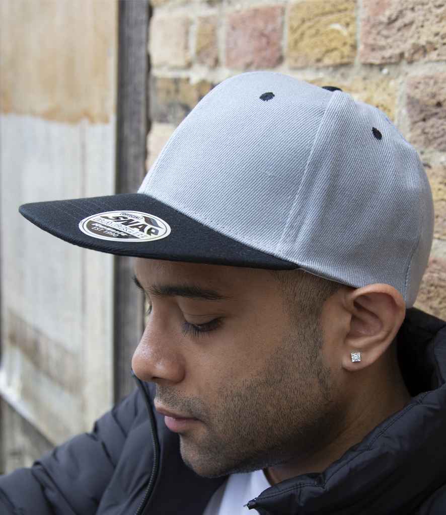 Result Contrast Bronx Snapback Cap in ONE Heather Grey Black by Result Headwear — Custom branded clothing by Print Press, featuring premium embroidery produced in our specialist print lab in the UK.
