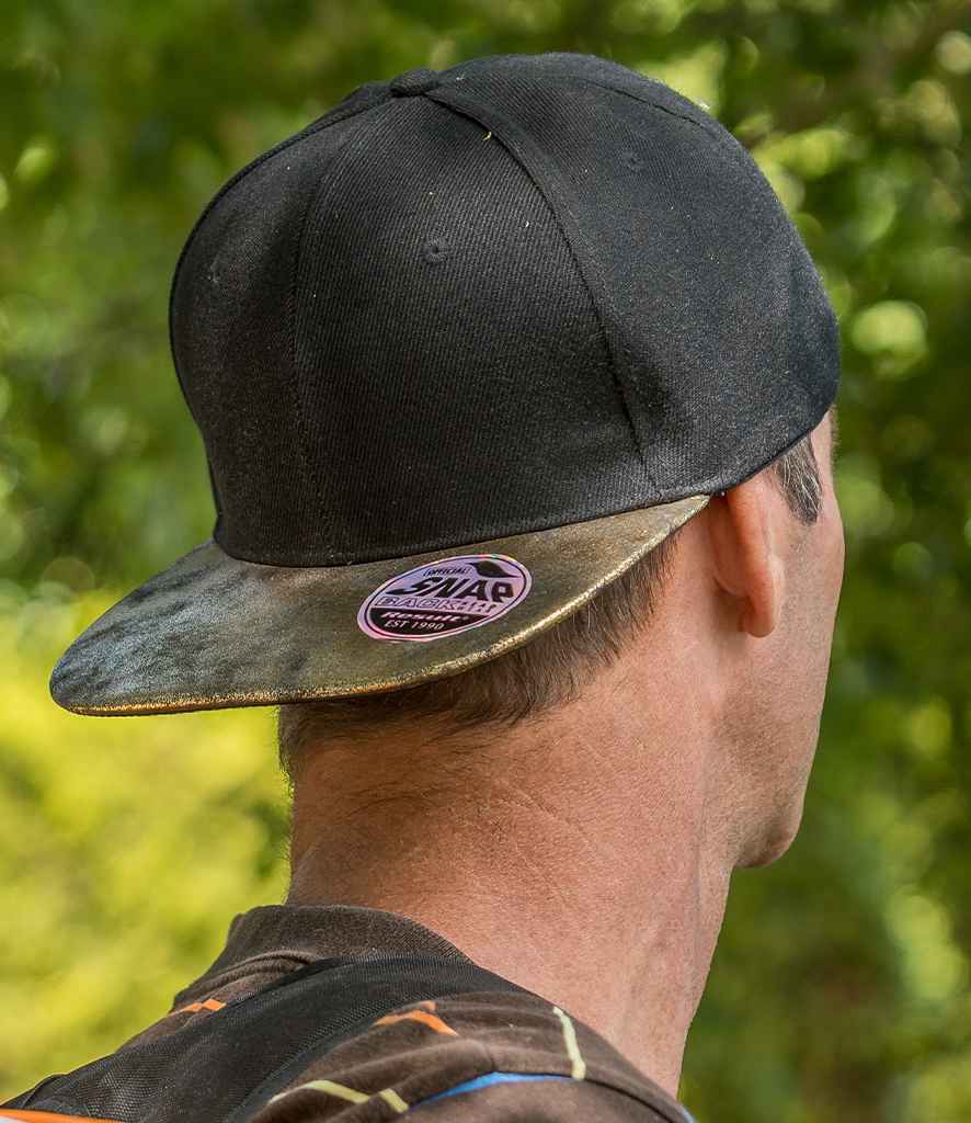 Result Bronx Glitter Snapback Cap in ONE Black Gold by Result Headwear — Custom branded clothing by Print Press, featuring premium embroidery produced in our specialist print lab in the UK.
