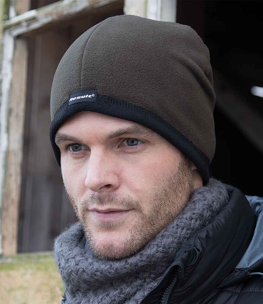 Result Reversible Micro Fleece Bob Hat in by Result Winter Essentials — Custom branded clothing by Print Press, featuring premium embroidery produced in our specialist print lab in the UK.