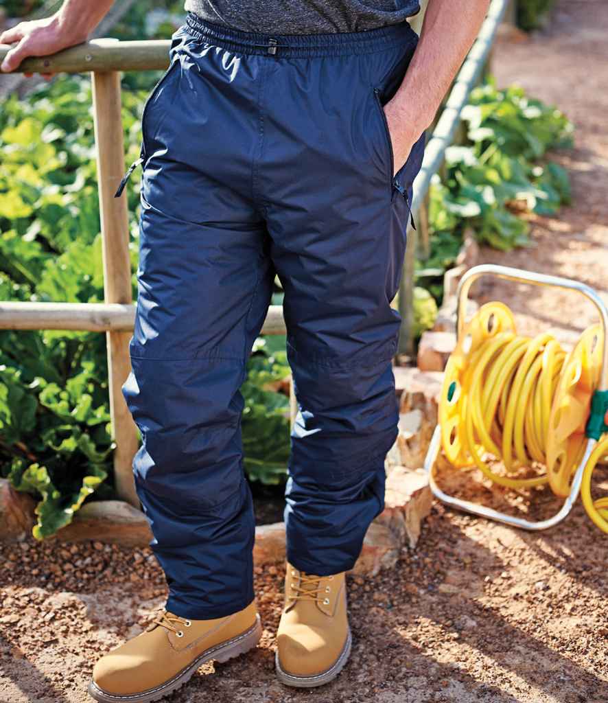 Regatta Wetherby Insulated Overtrousers in R Navy by Regatta — Custom branded clothing by Print Press, featuring premium embroidery produced in our specialist print lab in the UK.