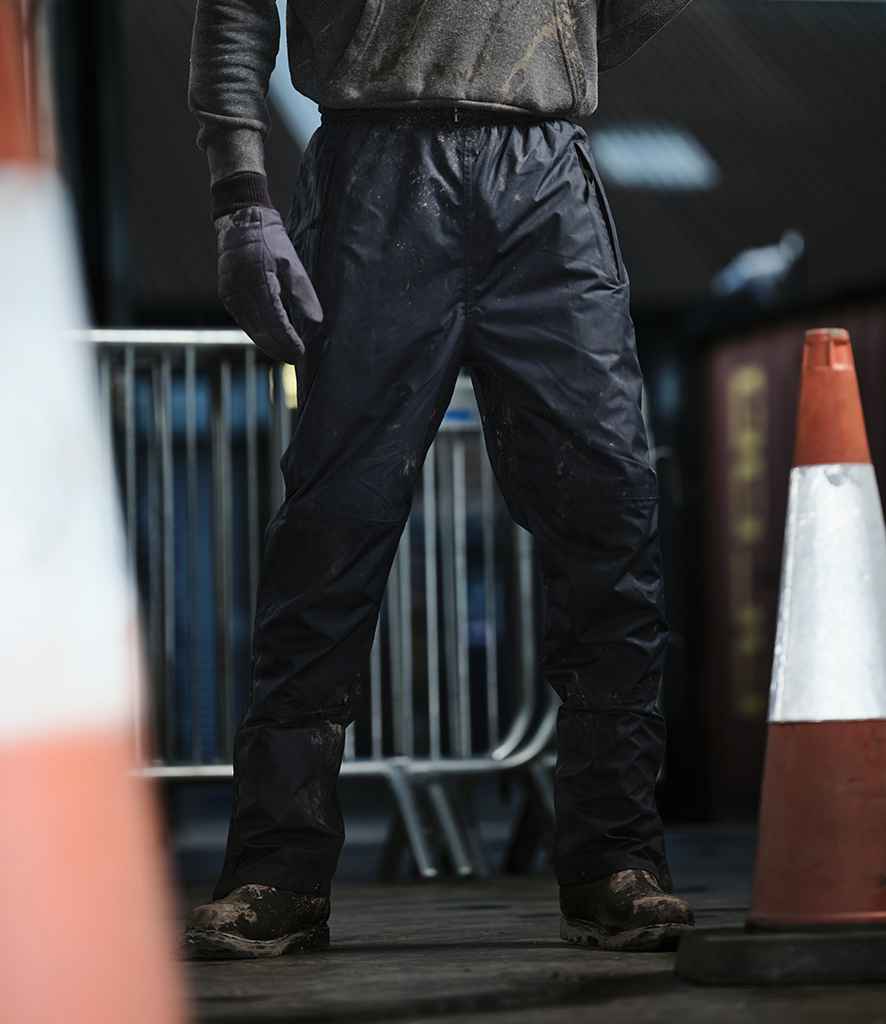Regatta Linton Waterproof Overtrousers in by Regatta — Custom branded clothing by Print Press, featuring premium embroidery produced in our specialist print lab in the UK.