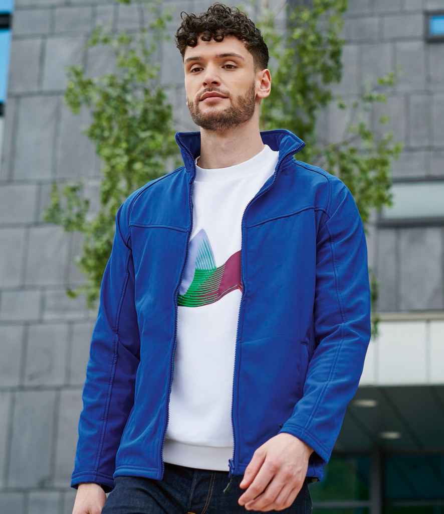 Regatta Uproar Soft Shell Jacket in Royal Blue by Regatta — Custom branded clothing by Print Press, featuring premium embroidery produced in our specialist print lab in the UK.