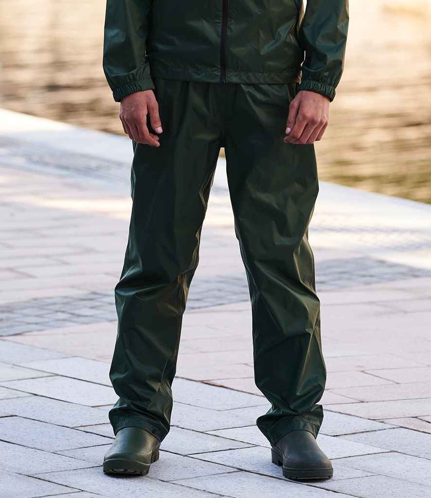 Regatta Pro Packaway Waterproof Breathable Overtrousers in Laurel by Regatta — Custom branded clothing by Print Press, featuring premium embroidery produced in our specialist print lab in the UK.