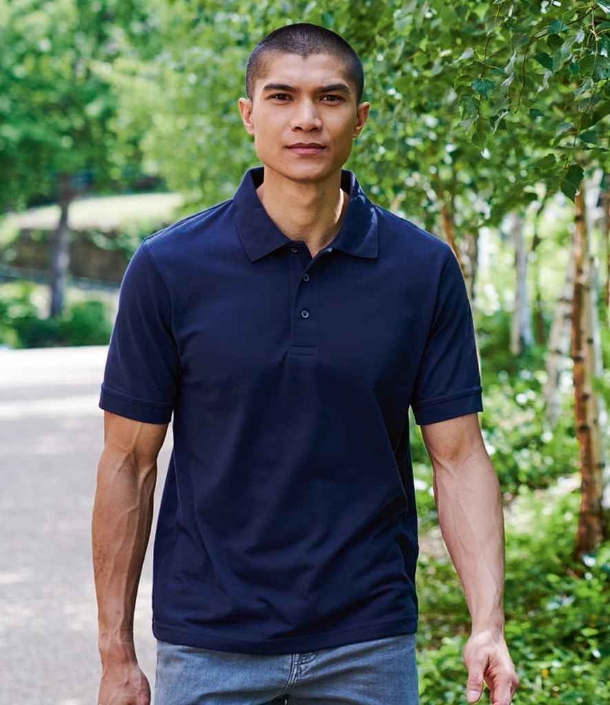 Regatta Classic Pique Polo Shirt in Navy by Regatta — Custom branded clothing by Print Press, featuring premium embroidery produced in our specialist print lab in the UK.