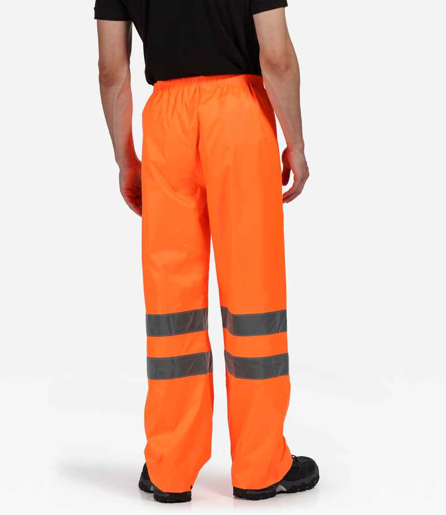 Regatta High Visibility Pro Packaway Overtrousers in by Regatta High Visibility — Custom branded clothing by Print Press, featuring premium embroidery produced in our specialist print lab in the UK.