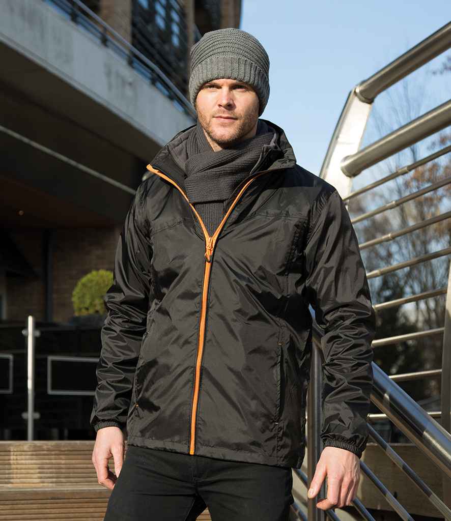 Result Urban HDi Quest Stowable Jacket in Black Orange by Result Urban — Custom branded clothing by Print Press, featuring premium embroidery produced in our specialist print lab in the UK.
