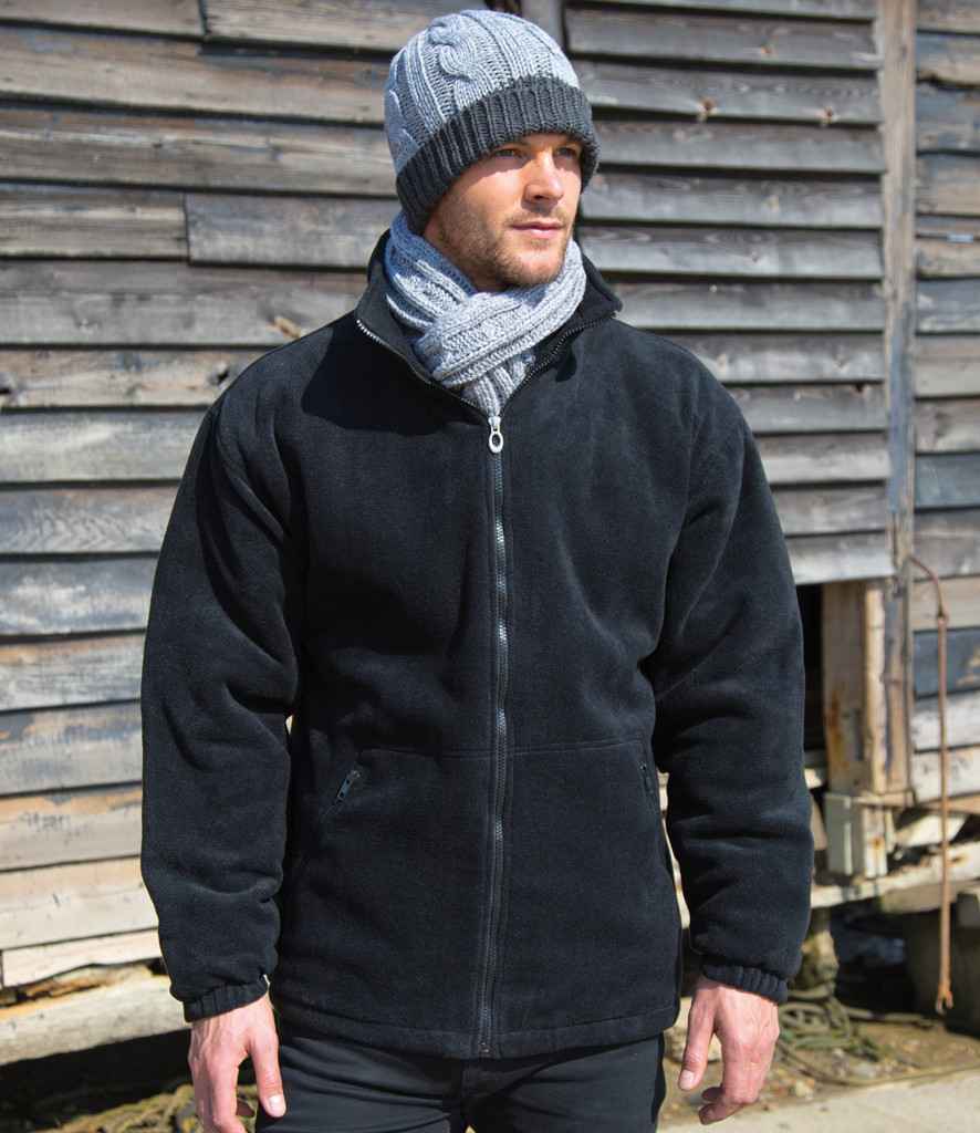 Result Core Polartherm™ Quilted Winter Fleece Jacket in Black by Result Core — Custom branded clothing by Print Press, featuring premium embroidery produced in our specialist print lab in the UK.