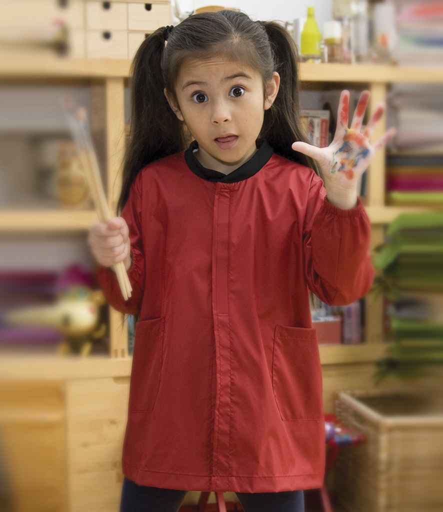 Result Core Kids Art Smock in Red by Result Core — Custom branded clothing by Print Press, featuring premium embroidery produced in our specialist print lab in the UK.
