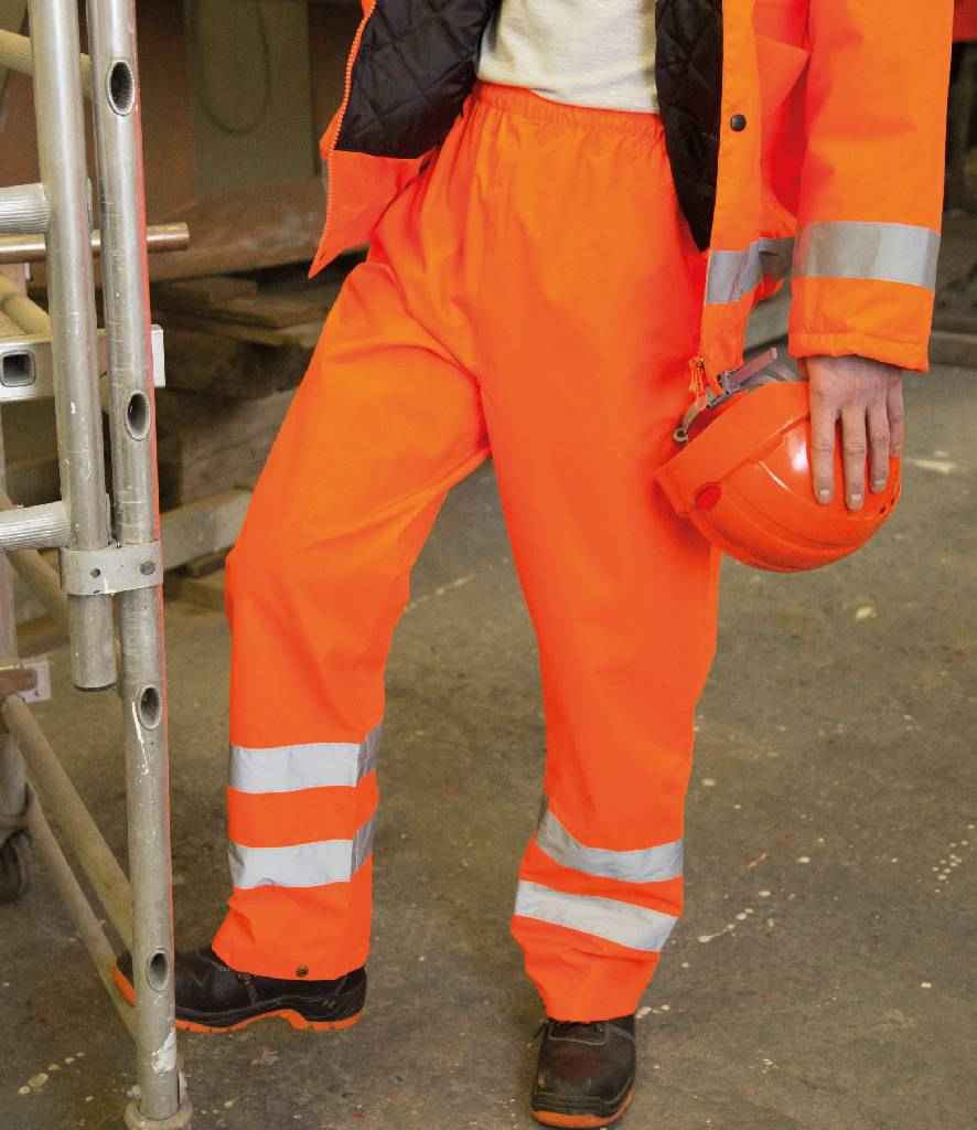 Result Safe-Guard Hi-Vis Trousers in Orange by Result Safe-Guard — Custom branded clothing by Print Press, featuring premium embroidery produced in our specialist print lab in the UK.
