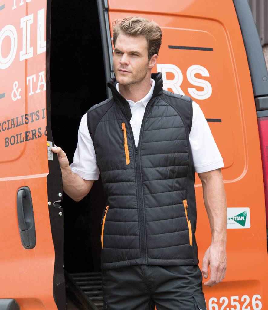Result Genuine Recycled Black Compass Padded Gilet in Black Orange by Result Genuine Recycled — Custom branded clothing by Print Press, featuring premium embroidery produced in our specialist print lab in the UK.