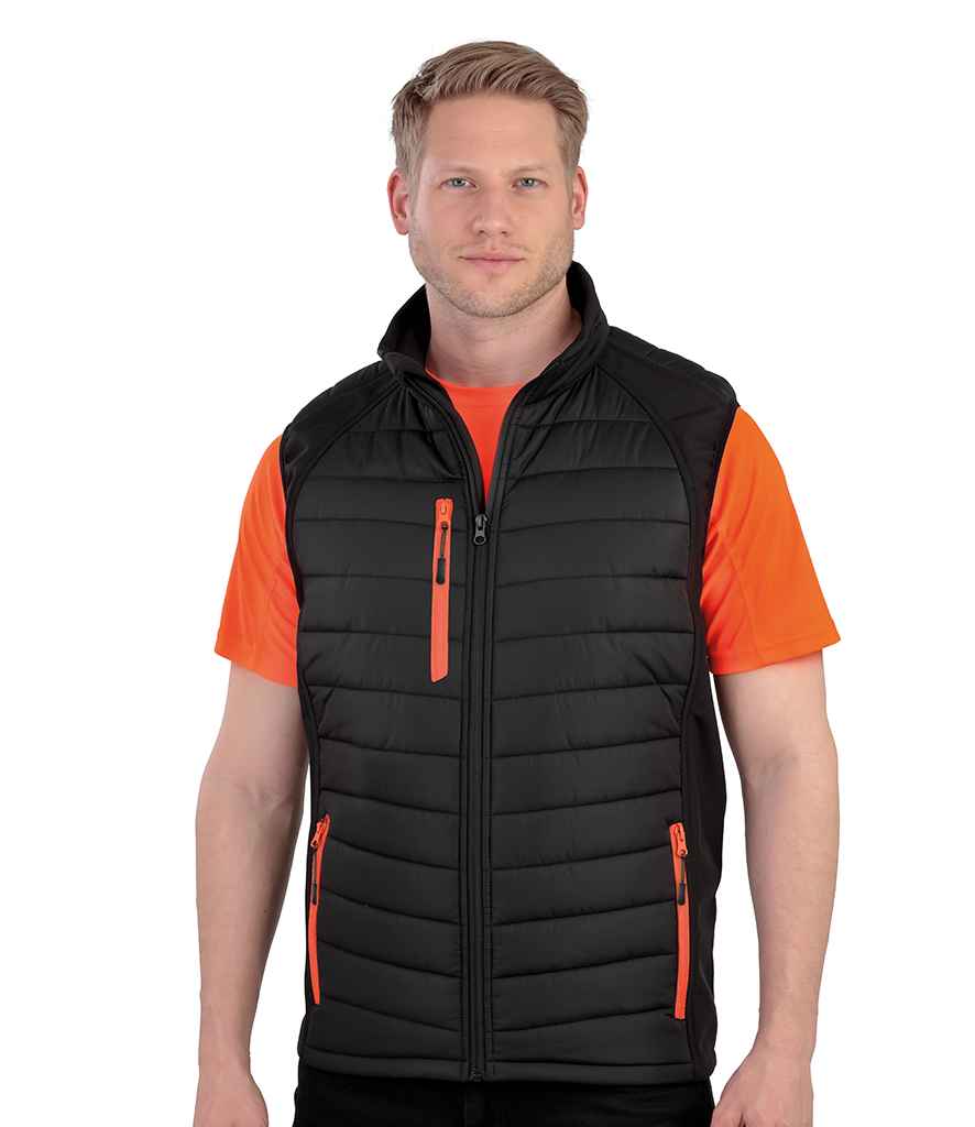 Result Genuine Recycled Black Compass Padded Gilet in by Result Genuine Recycled — Custom branded clothing by Print Press, featuring premium embroidery produced in our specialist print lab in the UK.