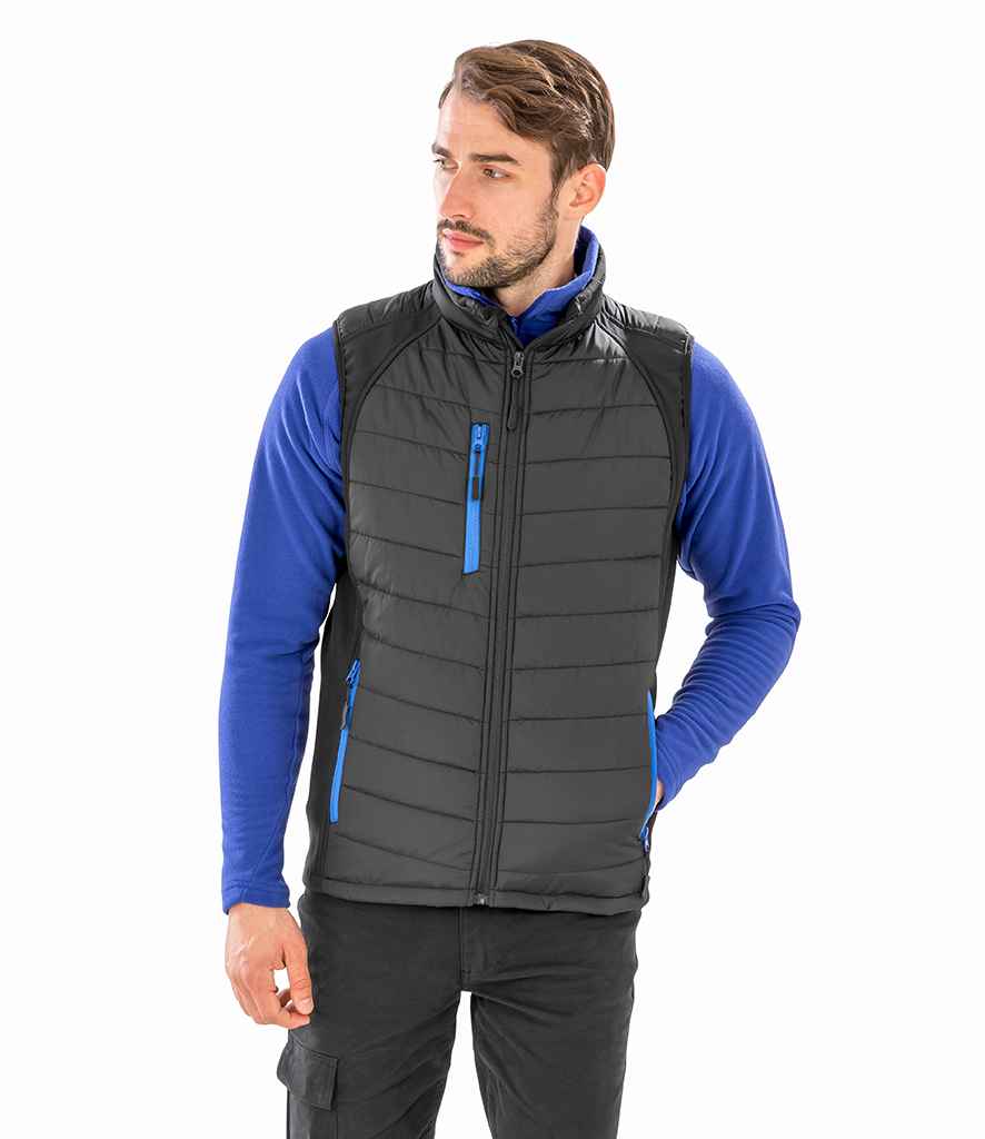 Result Genuine Recycled Black Compass Padded Gilet in Black Royal Blue by Result Genuine Recycled — Custom branded clothing by Print Press, featuring premium embroidery produced in our specialist print lab in the UK.