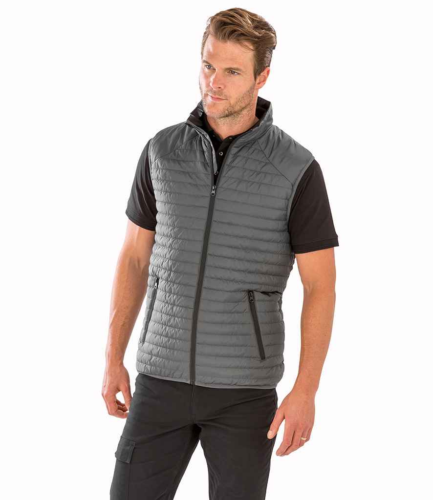 Result Genuine Recycled Thermoquilt Gilet in Grey Black by Result Genuine Recycled — Custom branded clothing by Print Press, featuring premium embroidery produced in our specialist print lab in the UK.