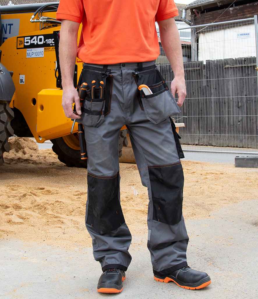 Result Work-Guard X-Over Holster Trousers in by Result Work-Guard — Custom branded clothing by Print Press, featuring premium embroidery produced in our specialist print lab in the UK.