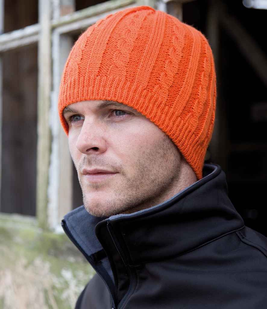 Result Mariner Knitted Hat in ONE Burnt Orange by Result Winter Essentials — Custom branded clothing by Print Press, featuring premium embroidery produced in our specialist print lab in the UK.