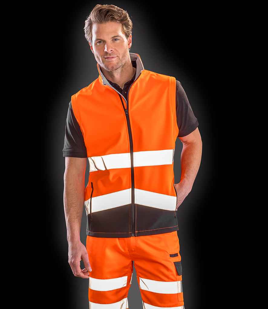Result Safe-Guard Printable Safety Soft Shell Gilet in Fluorescent Orange Black by Result Safe-Guard — Custom branded clothing by Print Press, featuring premium embroidery produced in our specialist print lab in the UK.
