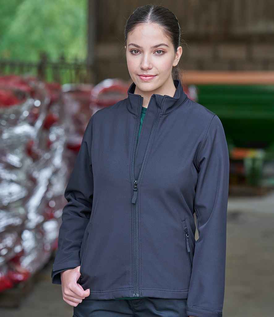 Pro RTX Ladies Pro Two Layer Soft Shell Jacket in Black by Pro RTX — Custom branded clothing by Print Press, featuring premium embroidery produced in our specialist print lab in the UK.