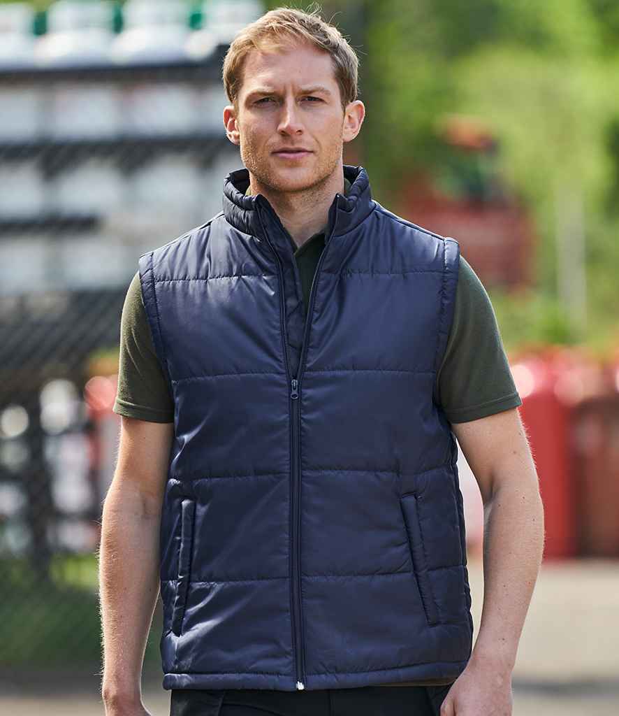 Pro RTX Pro Bodywarmer in Navy by Pro RTX — Custom branded clothing by Print Press, featuring premium embroidery produced in our specialist print lab in the UK.