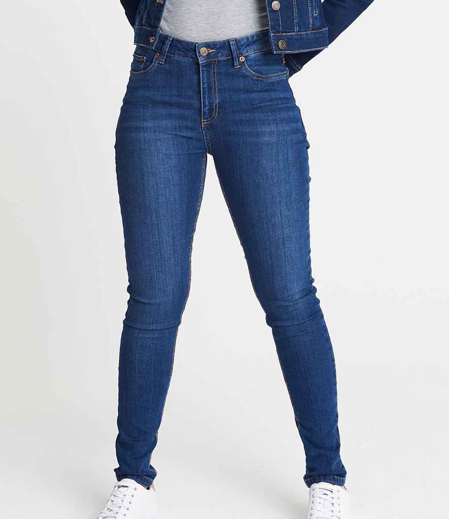 So Denim Ladies Lara Skinny Jeans in Dark Blue Wash by So Denim — Custom branded clothing by Print Press, featuring premium embroidery produced in our specialist print lab in the UK.