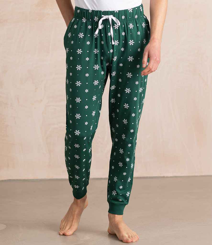SF Unisex Cuffed Lounge Pants in Bottle Green White Snowflakes by SF — Custom branded clothing by Print Press, featuring premium embroidery produced in our specialist print lab in the UK.