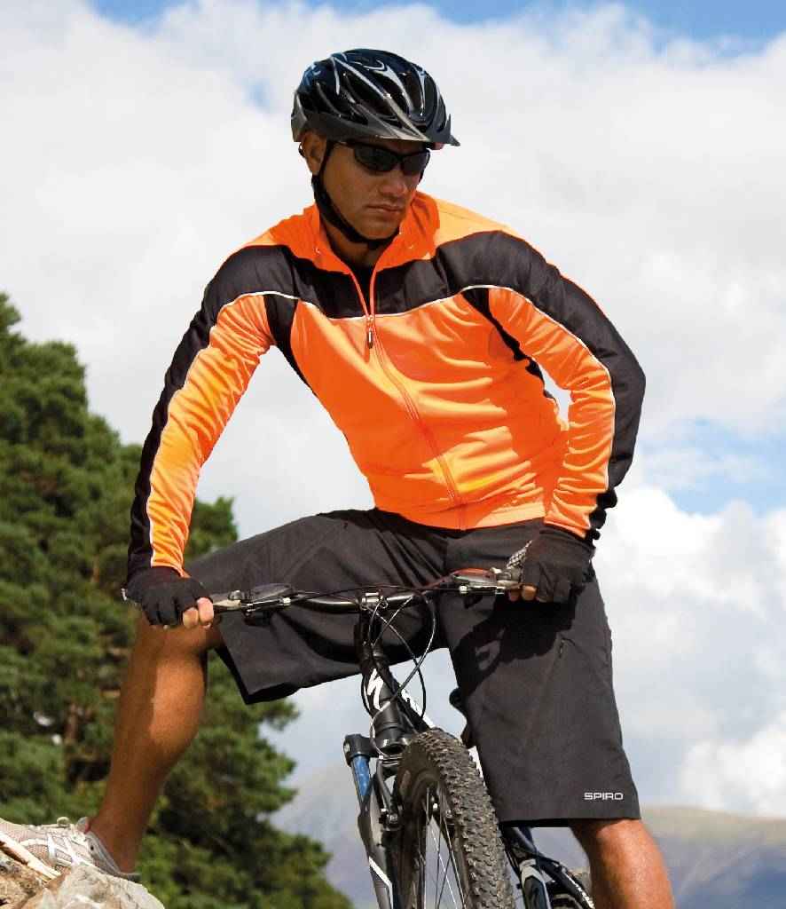 Spiro Bikewear Long Sleeve Performance Top in Neon orange Black by Spiro — Custom branded clothing by Print Press, featuring premium embroidery produced in our specialist print lab in the UK.