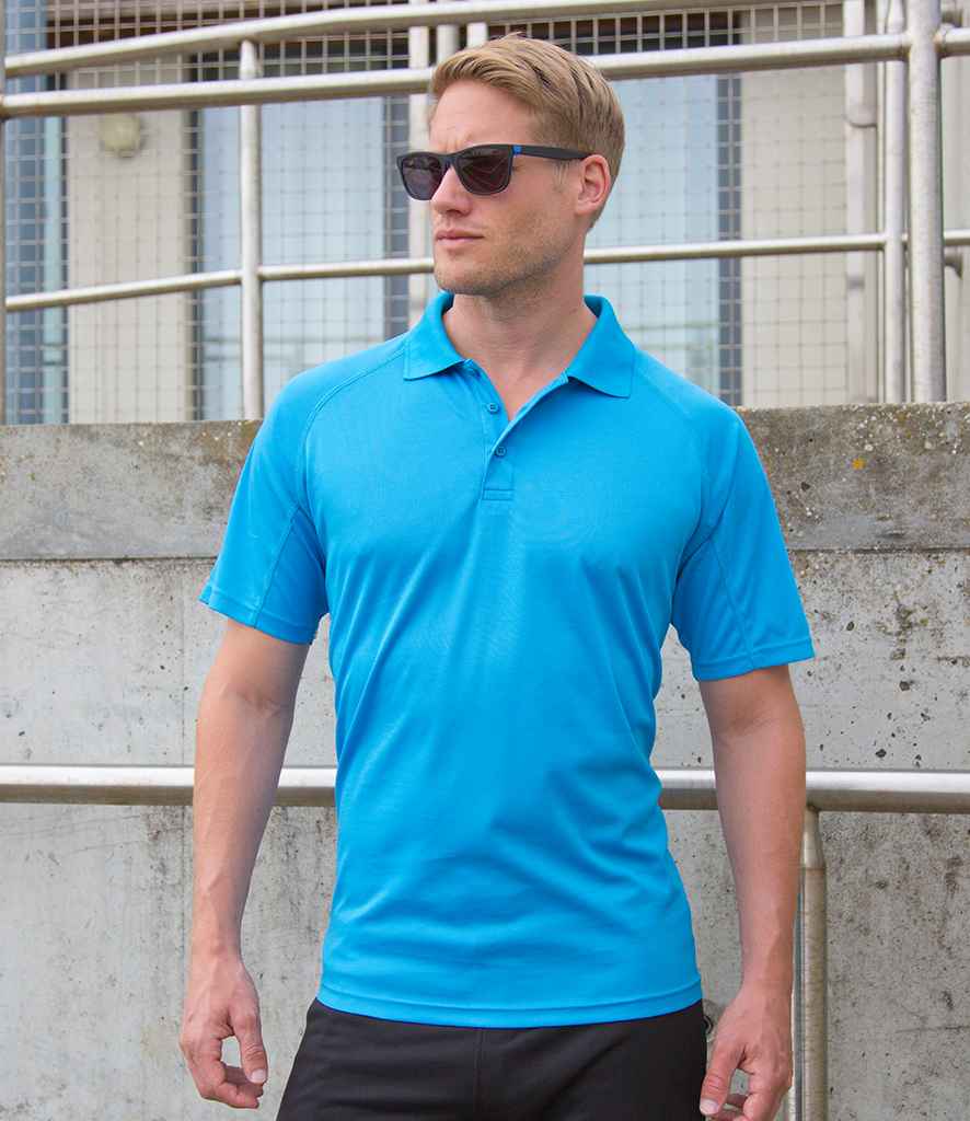 Spiro Impact Performance Aircool Polo Shirt in Ocean Blue by Spiro — Custom branded clothing by Print Press, featuring premium embroidery produced in our specialist print lab in the UK.
