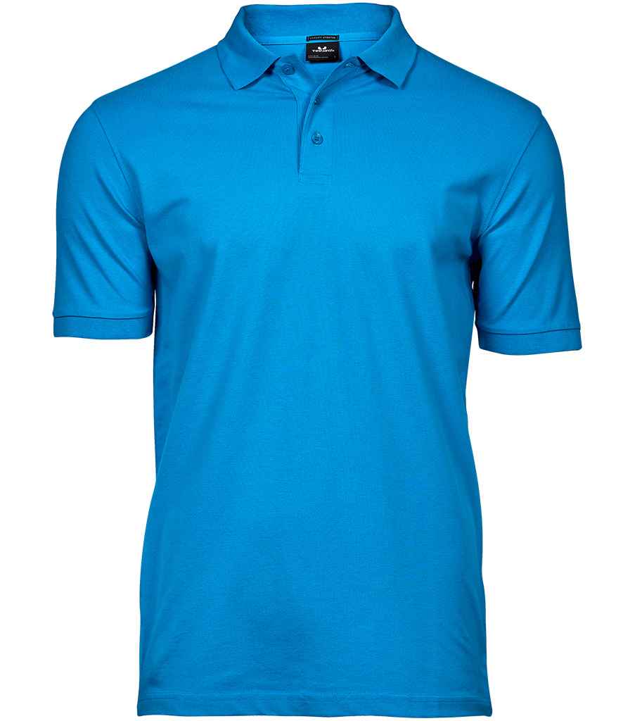 Tee Jays Luxury Stretch Pique Polo Shirt in Azure by Tee Jays — Custom branded clothing by Print Press, featuring premium embroidery produced in our specialist print lab in the UK.