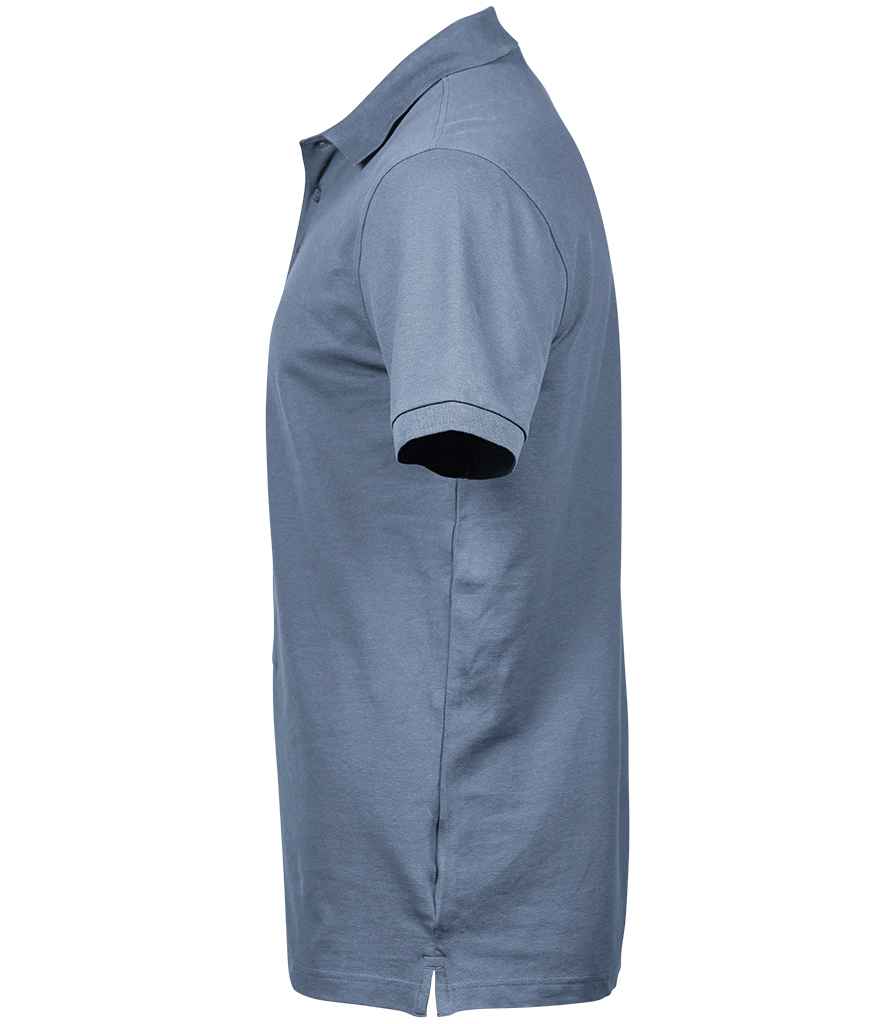 Tee Jays Luxury Stretch Pique Polo Shirt in by Tee Jays — Custom branded clothing by Print Press, featuring premium embroidery produced in our specialist print lab in the UK.