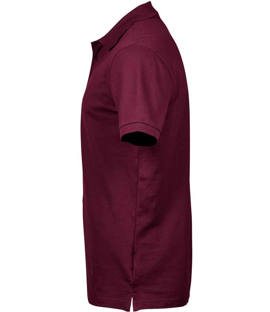 Tee Jays Luxury Stretch Pique Polo Shirt in by Tee Jays — Custom branded clothing by Print Press, featuring premium embroidery produced in our specialist print lab in the UK.