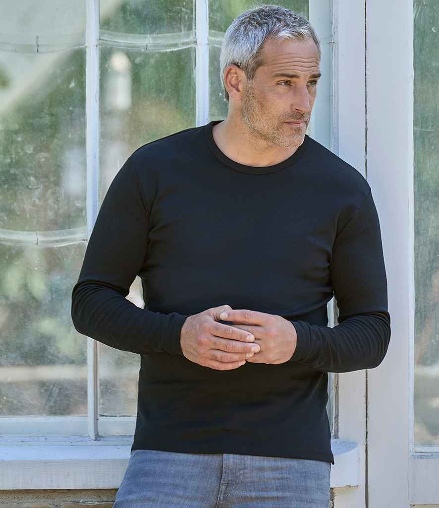 Tee Jays Long Sleeve Interlock T-Shirt in Black by Tee Jays — Custom branded clothing by Print Press, featuring premium embroidery produced in our specialist print lab in the UK.
