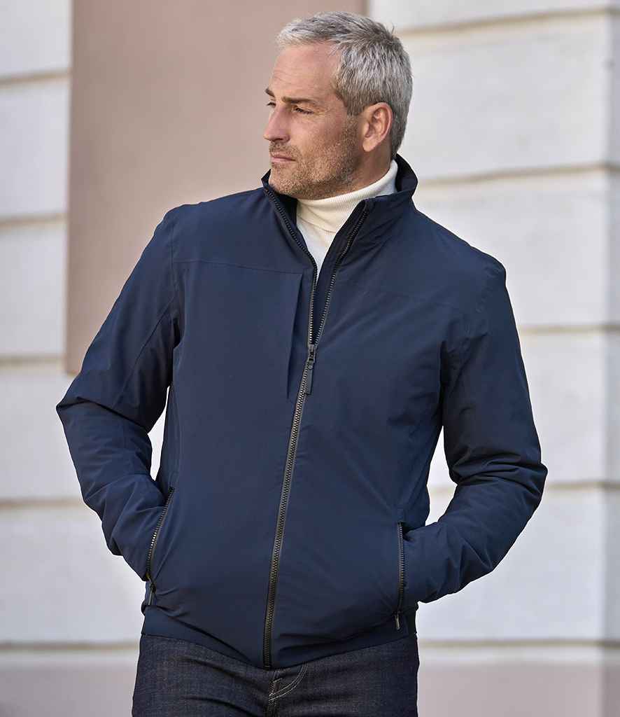 Tee Jays All Weather Jacket in Navy by Tee Jays — Custom branded clothing by Print Press, featuring premium embroidery produced in our specialist print lab in the UK.