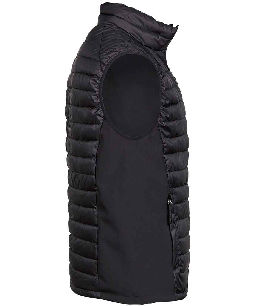 Tee Jays Crossover Padded Bodywarmer in by Tee Jays — Custom branded clothing by Print Press, featuring premium embroidery produced in our specialist print lab in the UK.