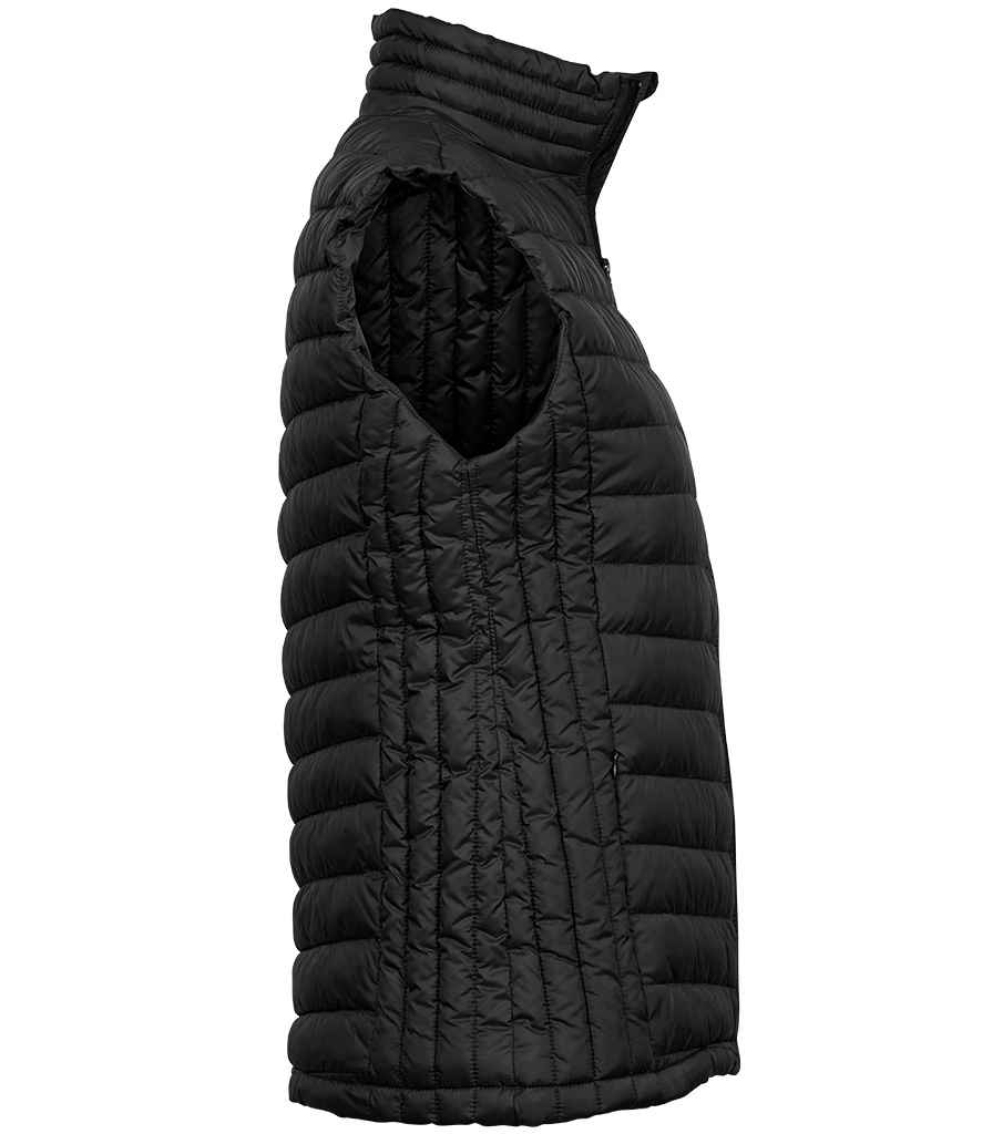 Tee Jays Ladies Zepelin Padded Bodywarmer in by Tee Jays — Custom branded clothing by Print Press, featuring premium embroidery produced in our specialist print lab in the UK.
