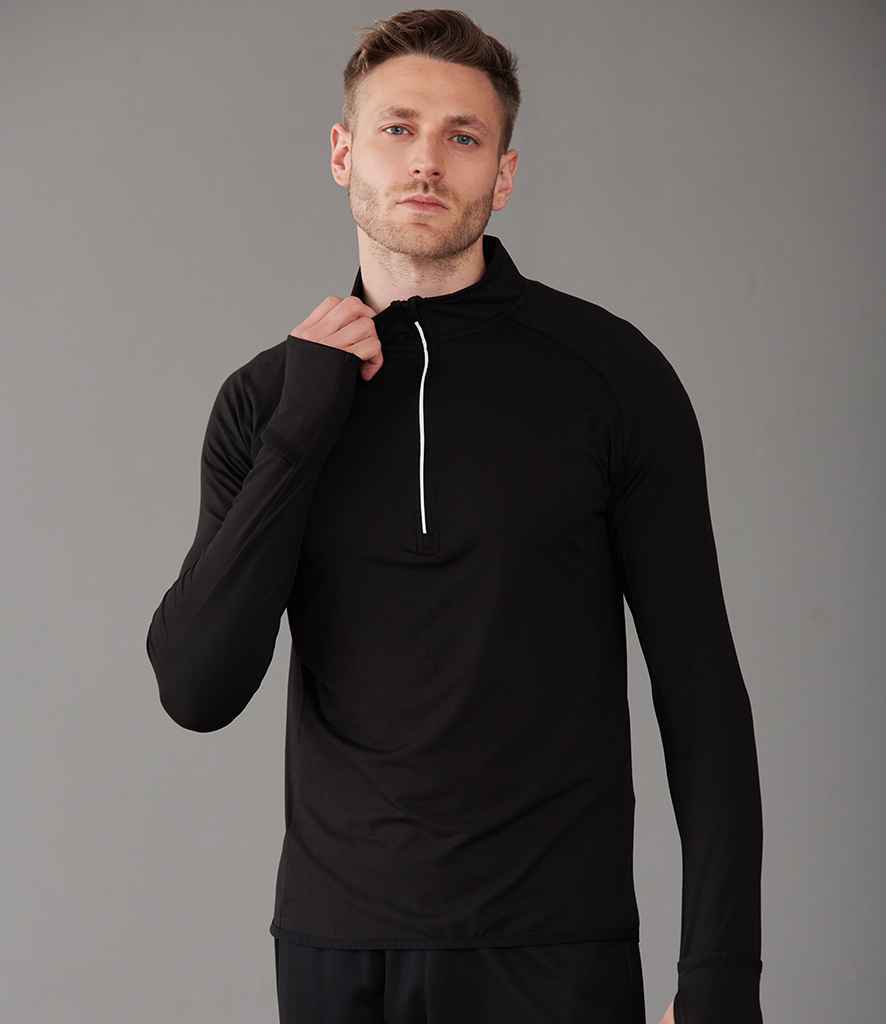 Tombo Long Sleeve Zip Neck Performance Top in Black by Tombo — Custom branded clothing by Print Press, featuring premium embroidery produced in our specialist print lab in the UK.