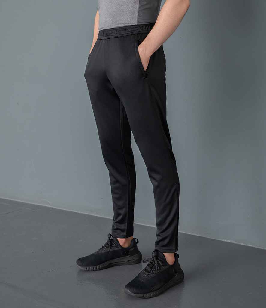 Tombo Slim Leg Training Pants in by Tombo — Custom branded clothing by Print Press, featuring premium embroidery produced in our specialist print lab in the UK.