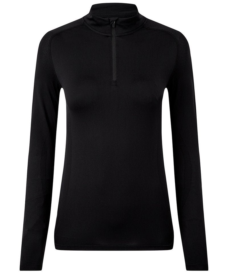 Women's Tridri Seamless '3D Fit' Multi-Sport Performance Zip Top in Full Black by TriDri — Custom branded clothing by Print Press, featuring premium embroidery produced in our specialist print lab in the UK.