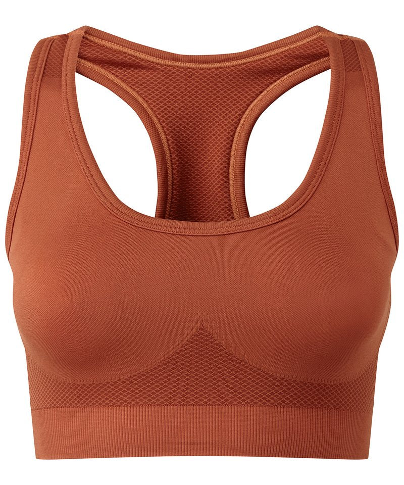 Tridri Seamless '3D Fit' Multi-Sport Sculpt Solid Colour Bra in Rust by TriDri — Custom branded clothing by Print Press, featuring premium embroidery produced in our specialist print lab in the UK.