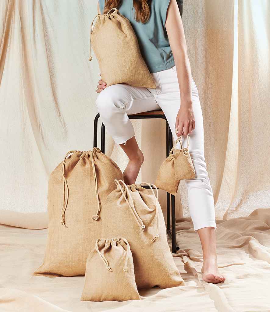 Westford Mill Jute Stuff Bag in by Westford Mill — Custom branded clothing by Print Press, featuring premium embroidery produced in our specialist print lab in the UK.