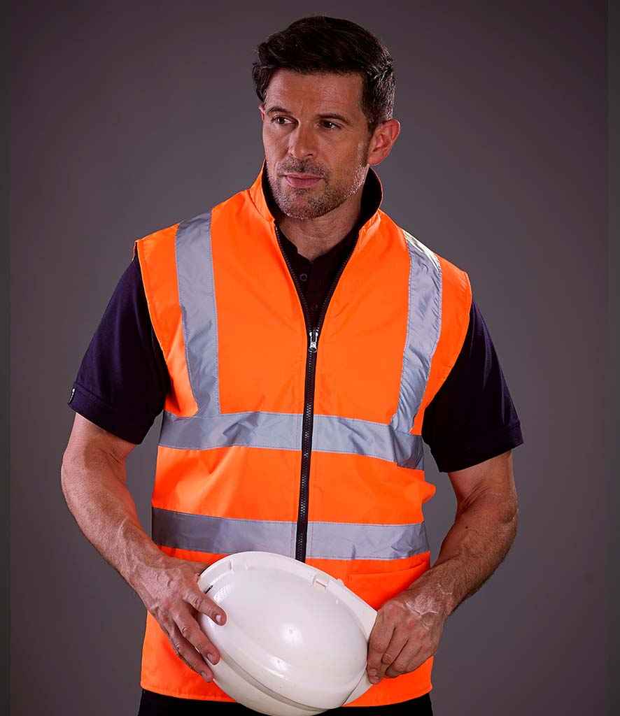 Yoko Hi-Vis Reversible Fleece Bodywarmer in Orange by Yoko — Custom branded clothing by Print Press, featuring premium embroidery produced in our specialist print lab in the UK.