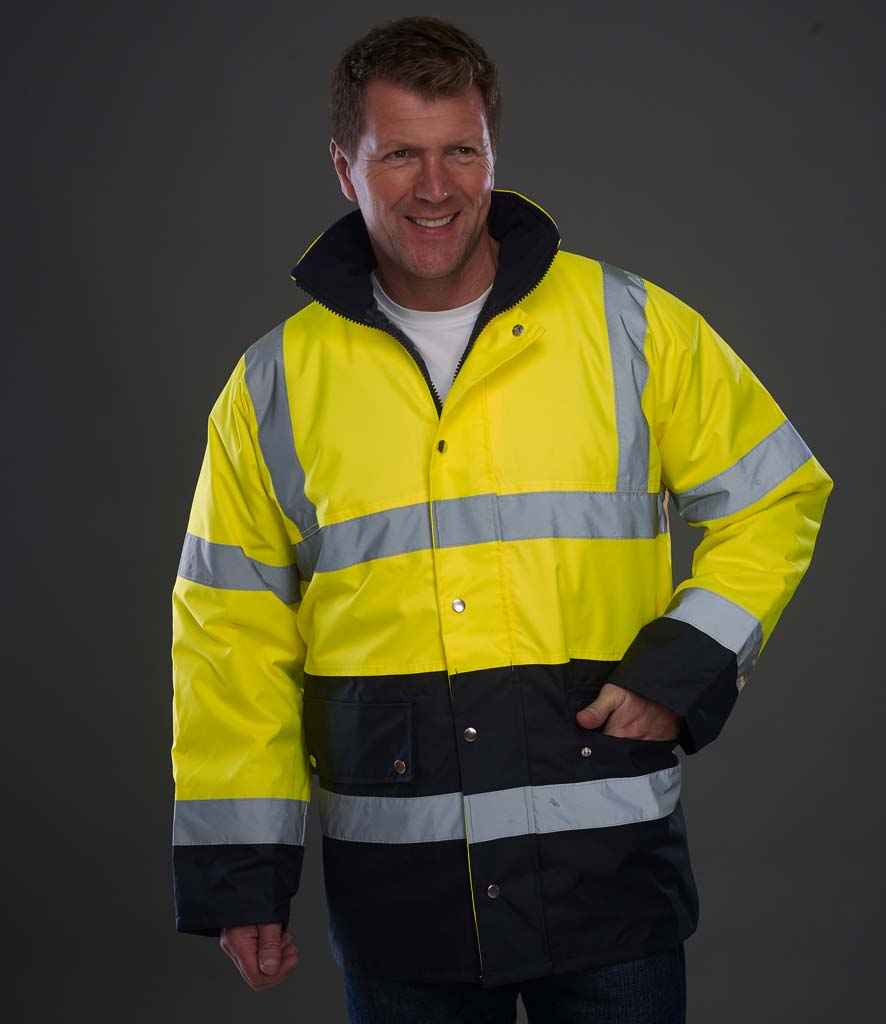 Yoko Hi-Vis Two Tone Motorway Jacket in Yellow Navy by Yoko — Custom branded clothing by Print Press, featuring premium embroidery produced in our specialist print lab in the UK.