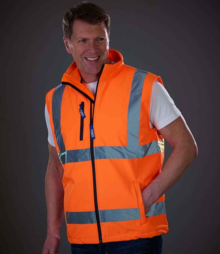 Yoko Hi-Vis Soft Shell Gilet in Orange by Yoko — Custom branded clothing by Print Press, featuring premium embroidery produced in our specialist print lab in the UK.