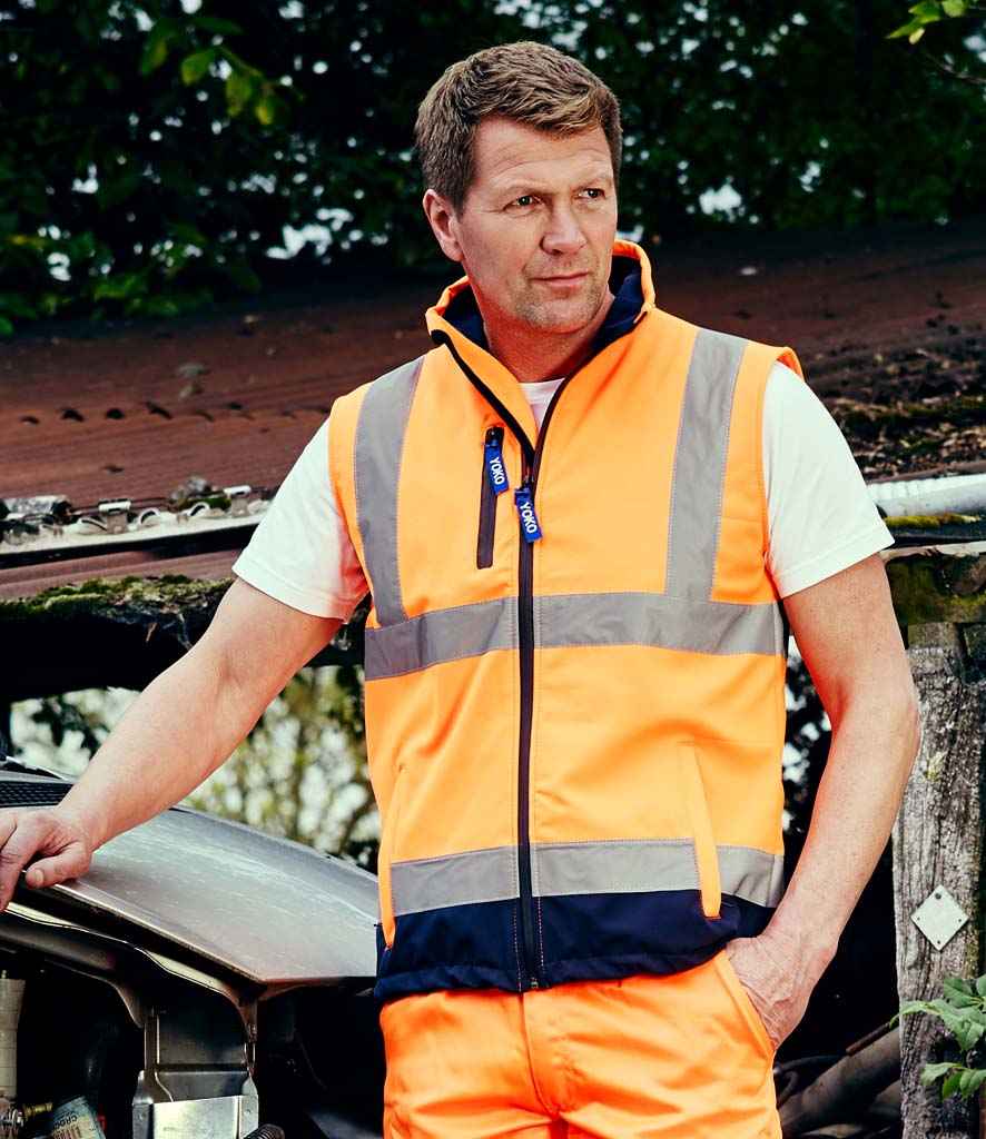 Yoko Hi-Vis Soft Shell Gilet in Orange Navy by Yoko — Custom branded clothing by Print Press, featuring premium embroidery produced in our specialist print lab in the UK.